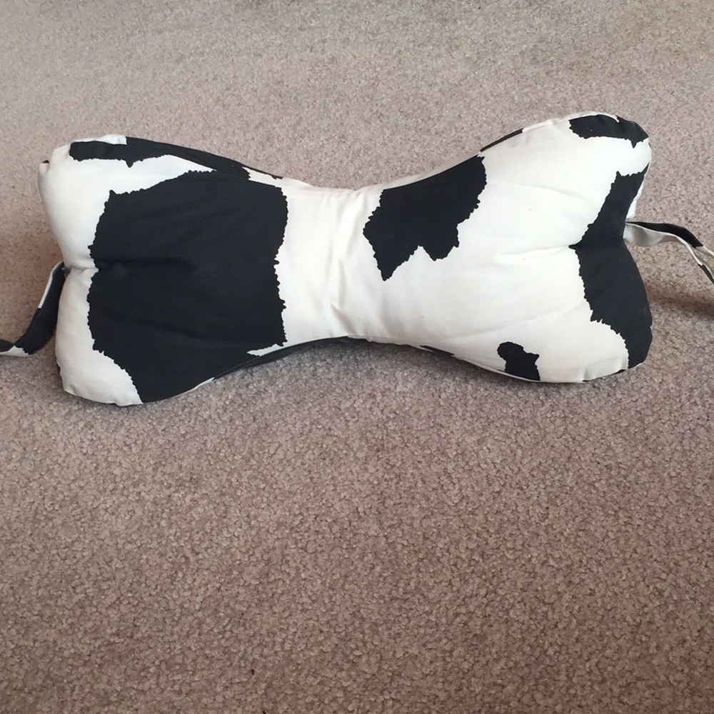 Dog bone neck pillow .